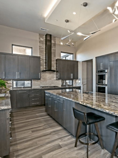 Kitchen with Granite Countertops and Wooden Floor CTC Tile